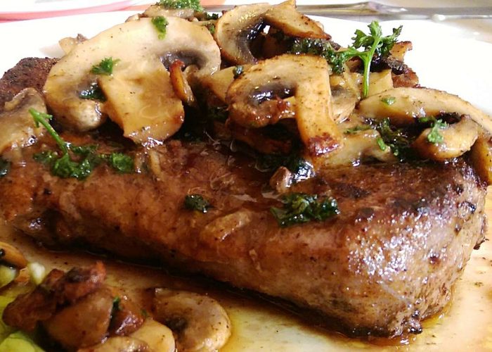 close-up-of-serving-steak-served-with-mushroom-slices-553000757-587cd1ba5f9b584db3eaf973